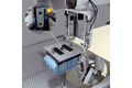 Collision protection between the robot and the injection molding tool