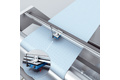 Non-contact length measurement of fabric sheets