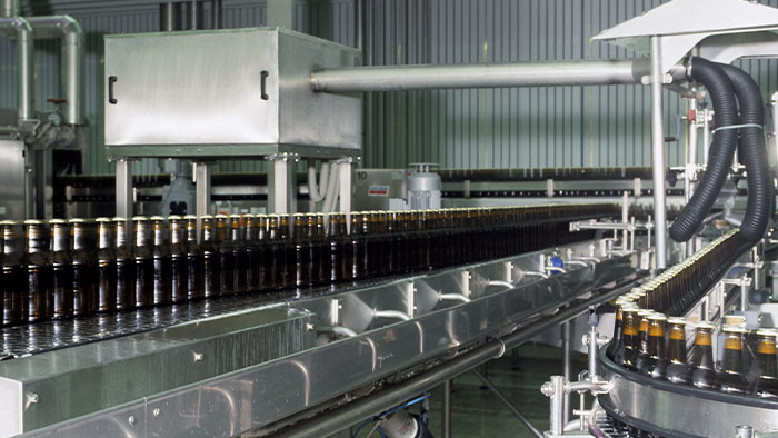 The beverage manufacturer saves costs and energy with the solution from SICK.