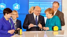 Angela Merkel visits SICK at trade fair